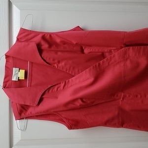 Blouse with side button closure.